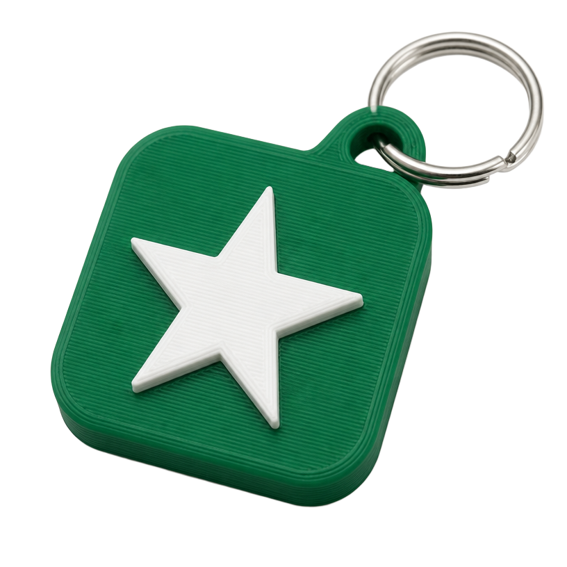 3D printed green NFC keychain tag with a custom star design